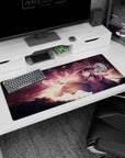 Megumin from KonoSuba anime in mid-explosion, fiery reds and embers, 36x16 inch desk pad, dramatic and cinematic.