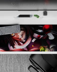 Anime desk pad 36x16 inches featuring Obanai Iguro in battle, serpent coiled, with a black and crimson color palette.