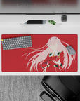 32x16 inches mouse pad with Zero Two in silhouette, deep red backdrop, and flowing pink accents for a striking anime vibe.