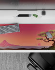 Striking 36x16 desk pad highlights tranquil tree, serene mountain, and glowing sunset in soft artistic detail