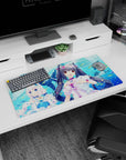 Two catgirls holding plush whales on an anime girl mouse pad 32x16 inches with watery backdrop.