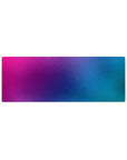 Compact 32x12 inches gradient mouse pad featuring a smooth blend of purples, pinks, and blues, perfect for stylish workspaces.