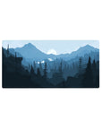 Cool-toned mountain 32x16 mouse pad with layered blue peaks and a glowing moon for a serene, calming workspace experience
