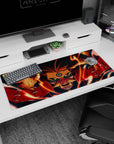 Kurama from Naruto staring forward on anime desk pad 36x16 inches, sharp yellow eyes and reaching claws.