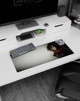 Fierce grace 28x12 mouse pad with Mikasa Ackerman, wrapped in her red scarf, capturing her quiet strength in a striking grayscale watercolor design