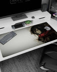 Fierce grace 40x20 anime desk mat with Mikasa Ackerman, highlighted by a grayscale watercolor design and her iconic red scarf, perfect for AOT fans