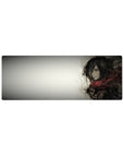 Mikasa Ackerman 32x12 mouse pad featuring a grayscale watercolor design, with Mikasa's fierce yet solemn presence and her iconic red scarf for a stunning workspace