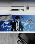 Striking 36x16 desk pad highlights Sung Jin-Woo’s powerful presence, intricate shadow tendrils, and radiant blue energy in stunning visual contrast