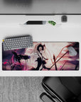 32x12 inches mouse pad with Jeanne d'Arc Alter, showcasing her intense presence and swirling pink petals against a dark backdrop.