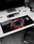 Large cosmic eye nebula scene desk pad 36x16 inches, swirling space pattern watching over your desk.