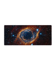 Cosmic eye galaxy swirl desk mouse pad, 28x12 inches, star-speckled deep space design.