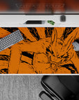 40x20 inches extended desk pad in fierce orange and inky black, wild chaotic energy for gaming.