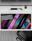 Cosmic gradient mouse pad 32x16 inches in purple, electric blue, pink, and smoky black.