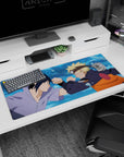 36x16 inches Naruto Shippuden desk pad showing Naruto Uzumaki and Sasuke Uchiha locked in battle.