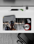 Anime mouse pad 28x12 inches featuring Inosuke from Demon Slayer in boar mask on charcoal background, adding energy to setup.