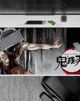 Anime desk pad 40x20 inches featuring Inosuke from Demon Slayer in a primal stance with iconic boar mask on charcoal background.