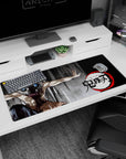 Anime desk pad 36x16 inches featuring Inosuke from Demon Slayer with boar mask on a gritty, charcoal background.
