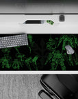 36x16 inches anime desk pad in electric green linework on deep black, sleek hangar-bay mood.