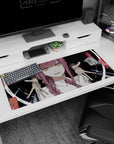 Sinister 36x16 anime desk mat featuring Makima's chilling presence, spiral eyes, and eerie hands for a dark, intense desk setup
