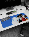 36x16 inches anime desk pad showing three friends shoulder to shoulder, kimono and glasses, red robe, earring.