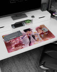 32x16 inches anime mouse pad featuring grinning chaotic girl and cool silver-haired teammate facing forward.
