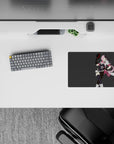 Bold pink-and-black anime mouse pad 14x10 inches, flirty wink vibe on a clean gray background.
