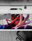 36x16 inches anime desk pad in crimson, purple, and inky blue sparks, sleek fast-glide gaming surface.