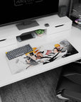 Artistic 32x12 inches mouse pad with Ichigo Kurosaki battling Vasto Lorde form, destruction, bold contrasts, and shattered debris.