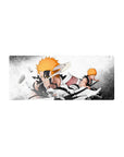 Mouse pad featuring Ichigo Kurosaki, 28x12 inches, battling his Vasto Lorde form with intense destruction and bold contrasts.