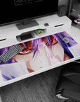 Red-eyed violet-haired anime warrior locked in a battle stare on a 40x20 inches desk pad.