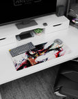 Anime girl mouse pad 28x12 inches showing black hair with red streaks, lunging mid-sprint on white.