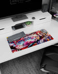 28x12 inches mouse pad showing a pink-haired kimono warrior smiling amid cherry blossoms, petals swirling.