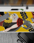 Dark-playful anime desk pad 40x20 inches in mustard, gray, green, and red plaid with swirling scythe energy.