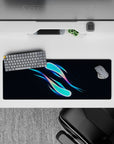 Intense 32x12 desk mat features flowing motion and radiant colors with intricate gradient details for fans