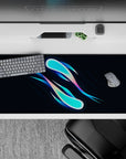 Striking 36x16 desk pad highlights radiant hues and fluid motion with intricate pastel details in stunning contrast
