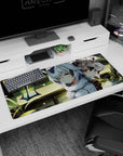 36x16 inches anime desk pad showing two cute beast-ear girls by sunlit water in a quiet wooden room.