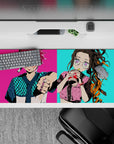 Desk pad 36x16 inches featuring Tanjiro and Nezuko from anime in streetwear with neon colors and urban flair.