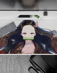 Desk pad 40x20 inches featuring Nezuko from Demon Slayer, with her flowing black hair and red accents against a white backdrop.