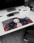 Nezuko anime mouse pad 32x16 inches with her serene gaze, black hair with red tips, on a gold-flecked white background.