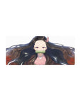 Nezuko anime mouse pad 28x12 inches featuring her serene gaze, black hair with red tips, and gold flecks on white background.