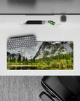 28x12 inches mouse pad with serene nature design, blending lush greens, towering pines, and misty mountain peaks for a tranquil vibe.
