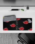 Compact 28x12 mouse pad highlights Akatsuki's mysteries with intricate cloud and scroll artistry
