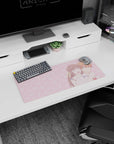 28x12 inches anime mouse pad showing brown-haired girl with ribbon hugging orange-haired boy, eyes closed laughing.