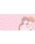 36x16 inches anime desk pad with cute doodle accents, hugging couple, blush background, smooth tracking.