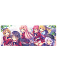 Anime girl mouse pad 32x12 inches with school club scene, pastel background, and leaf accents.
