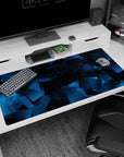 Large 40x20 inches mouse pad with an abstract blue design, featuring transparent layered squares for a sleek, tech-inspired aesthetic.
