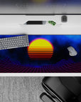 Striking 36x16 desk pad highlights vibrant sunset hues and cosmic depth with intricate grid details