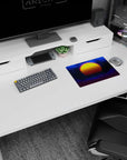 Iconic 14x10 desk mat celebrates Cosmic Sunset Grid with vibrant sunset, glowing grids, and starry details