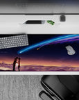 36x16 inches anime desk pad in indigo, neon blue and violet with warm sunset fade, dreamy calm glow.