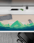36x16 inches mouse pad featuring green mountains and soft peach skies, offering a peaceful aesthetic and smooth control for work or play.